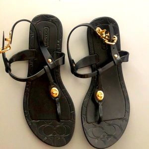 Coach black  with gold lining shoes